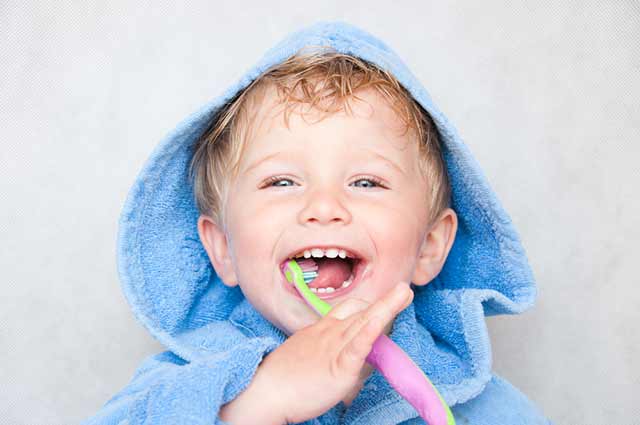 Dental emergency for kids brushing his teeth